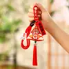Um único passo para alcançar o sucesso: sachês perfumados, amuletos da sorte e presentes motivacionais para os exames de ingresso no ensino médio e na faculdade de 2026. Pingentes com tema de Zongzi