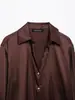 Al por mayor transfronterizo Estilo europeo y americano Moda de primavera 2025 Casual Satén de seda Textura Solapa Holgada Camisa para mujer