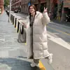 Novo vestido feminino de 2026, corte slim, comprimento médio, acima do joelho, estilo coreano, caimento solto, com capuz, espessado, versátil, moderno e casual