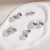 Pendientes de Botón Geométricos Personalizados Ins Transfronterizos Europeos y Americanos Hebilla de Oreja Martillada de la Corte Francesa Pendientes Irregulares Retorcidos