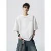 2026 Verano Nuevo Resistente Estilo Étnico Diseño Bordado Camiseta de Manga Corta para Jóvenes Hombres Corte Holgado Top de Moda