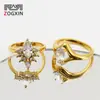 Anillo de acero inoxidable estilo corte marquisa de circón con diamantes de forma irregular y cúmulos de estrellas, superficie curva, joyería de alta gama