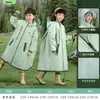 Impermeable infantil para niños y niñas, estilo largo, impermeable de cuerpo completo, a prueba de lluvia, con espacio para mochila, poncho portátil para uso escolar
