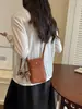 Bolsa de teléfono popular de cuero suave para mujer, nueva 2025, bolso pequeño vintage simple, bolso cuadrado mini casual para hombro