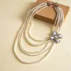 Collar de perlas en capas con cuentas transfronterizo europeo y americano, cadena para la clavícula estilo fiesta vintage, lujo ligero, accesorio versátil de alta gama para mujer