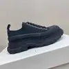 Zapatillas de lona McQueen para mujer, color blanco y negro, a juego, casuales, con plataforma, blancas, que aumentan la altura, para parejas, estilo muffin daddy, versión alta para hombre.