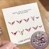 Paquete de material para manicura 2024 primavera y verano nuevo estilo mono mismo estilo hacha Corazón Torcido Cristal K9 diamante flash manicura al por mayor