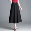 Nueva Falda de Mujer de Color Sólido de Moda para el Trabajo 2026 Otoño Versión Coreana Cintura Alta Adelgazante con Caída Falda Midi de Línea A