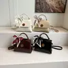 Bolso retro muy elegante para mujer, nueva moda primavera 2026, bolso pequeño simple de hombro cruzado