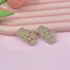 Nuevos Bonitos Accesorios de Joyería Pasador DIY Agujero Hebilla de Zapato Accesorios Accesorios para el Cabello Pasador Material de Pegatina para Funda de Teléfono Móvil Venta al por Mayor