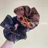 Estilo Francês Levemente Luxuoso Redondo Estampa de Leopardo Elástico para Cabelo Corda de Cabelo Moda Retrô Estilo Levemente Luxuoso Acessórios de Cabelo Simples Versáteis Venda por Atacado
