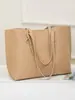 Bolso de Hombro 2025 Nuevo Bolso Tote de Gran Capacidad Bolso de Hombro Simple y de Moda Versátil para Viajes Cotidianos Textura Bolso para Mujer