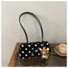 Comercio exterior transfronterizo minimalista con colgante de lunares 2026 terciopelo moda gran capacidad estilo coreano bandolera para el trabajo bajo el brazo para mujer