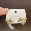 Pendientes de Mariposa de Zirconia Europeos y Americanos Transfronterizos para Mujer Joyería de Corea del Sur Pendientes de Estilo Literario Pendientes Elegantes Simples Nuevos de Celebridad de Internet