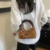 Bolsa de Axila Retro Melanoid Feminina Outono 2026 Nova Bolsa Tote Patchwork de Camurça Cor de Bloco de Nicho Bolsa de Ombro Único de Mão
