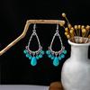 Pendientes Retro Étnicos Europeos y Americanos de Turquesa Azul con Diseño de Anillo Hueco, Colgantes de Borla Floral de Gama Alta, Pendientes Exagerados de Gota de Agua