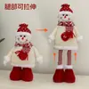 Suministros de decoración navideña transfronterizos: figura telescópica roja de Papá Noel, adorno para escaparate, decoración de ambiente festivo para personas mayores