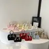 Bolso Platino de Gran Capacidad Bolso de Mujer Patrón Granulado Simple Elegante Bolso de Hombro Estilo Extranjero Versátil Cerradura Bolso Cruzado Portátil