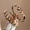 Pinza para el pelo con estampado de leopardo y diseño de nube hueca para mujer, estilo de alta gama, nuevo modelo Otoño e Invierno 2025, adecuada para cabello grueso, accesorio para el pelo tipo pinza de tiburón