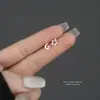 Brincos de Prata Pura S999 Estrela e Lua com Zircônia para Mulheres, Luxo Acessível Design de Nicho, Versátil para Piercing Criativo Brincos Assimétricos