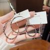 Pendientes elegantes estilo Hong Kong 2024 nuevos de moda lujo ligero aguja de plata s925 círculo grande moda versátiles pendientes de círculo de celebridad de internet