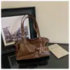 Colección de otoño 2026 transfronteriza: bolso de axila estilo retro de nicho, bolso de mano casual, bolso de hombro y bolso de mano de gran capacidad para el trabajo