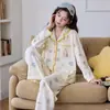 Al por mayor en stock 6040 algodón CVC manga larga pantalón largo conjunto de dos piezas de punto para mujer otoño para transmisión en vivo ropa de casa transfronteriza para mujer