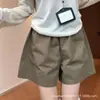 Shorts tipo capullo verde militar para mujer, estilo casual suelto de cintura alta para verano, pantalones deportivos de pierna ancha de tres cuartos de longitud media línea A para petite