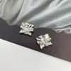 Versión coreana de accesorios de aleación de diamante cuadrado de alto sentido joyería de sirena colorida accesorios para el cabello dulces y geniales zapatos con agujeros material de flor