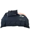 Juego de Ropa de Cama de Cuatro Piezas de Color Sólido Cepillado de Lujo Nuevo al por Mayor para Dormitorios Estudiantiles y Celebraciones de Bodas, Juegos de Fundas de Edredón Bordadas Lavables