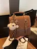 Bolsa Retro Mate Moda Femenina Versátil Mochila de Estudiante Otoño 2025 Nueva Tendencia Callejera Ligera Mochila de Viaje