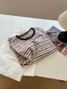 Comercio Exterior Primavera y Otoño 2026 Nueva Camiseta de Manga Larga a Rayas para Mujer Holgada Adelgazante Estilo Coreano Ropa Exterior Top