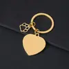 Llavero de Pata de Perro Hueca Transfronterizo Metal Forma de Corazón Impresión Láser Color Material en Blanco Regalo de Vacaciones Llavero Grabado