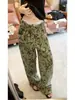 Jeans retro americanos con camuflaje y tachuelas para mujer, principios de otoño de 2026, estilo callejero, diseño moderno y genial, pantalones de pierna ancha hasta el suelo