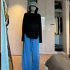 Top casual negro versátil de manga larga estilo coreano para mujer de principios de otoño, suave y favorecedor, camiseta básica de color liso