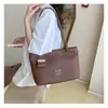 Elegante bolso de mano retro para mujer, nuevo bolso cruzado versátil de moda 2026, bolso de mano para el trabajo, bolso tipo cubo, bolso de axila