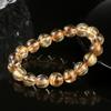 Pulsera de Cristal Dorado Natural Productos de Alta Calidad Cristal Cabello Piedra Cabello Shun Bola Anillo Perla Joker Anillo Individual Outlet de Fábrica