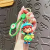 Llavero de elfo recogiendo flores de dibujos animados creativo muñeca de niña linda colgante para mochila de estudiante pequeño regalo al por mayor