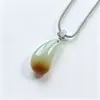 Jade Dongling natural, colgante de colmillo de lobo colorido, charm de colmillo de lobo bicolor verde caramelo, unisex, nuevo accesorio de colgante de jade estilo chino