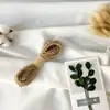 Cuerda decorativa tejida multiespecificación accesorios hechos a mano DIY cordón de etiqueta de alta calidad cuerda de yute tejida suministro directo de fábrica