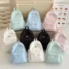 Mochila nueva y elegante estilo coreano para niñas, mochila fresca de lunares en colores caramelo, bolsa ligera de doble hombro para estudiantes de secundaria y preparatoria