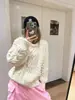 Suéter de tricô grosso com tranças, estilo retrô coreano, casual, modelagem solta, gola redonda, peça de nicho para outono e inverno.