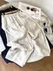 Alto custo-benefício para o verão de 2026! Calça cropped feminina de liocel e linho, respirável, corte relaxed, cintura elástica com amarração, perna larga.