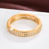 Nuevos anillos de circón de doble fila, elegantes y versátiles, anillos lisos de cobre exquisitos para parejas de hombres y mujeres, venta al por mayor de joyería, artículo de venta caliente transfronterizo