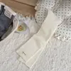 Nuevos calcetines de rayas verticales estilo Miu para otoño e invierno con etiquetas de tela en inglés, calcetines apilados hasta la mitad de la pantorrilla estilo ins, color liso estilo Maillard