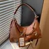 Bolso de axila de diseño de nicho versátil de moda transfronterizo, bolso cruzado de gran capacidad de alta gama, bolso tipo dumpling con bloques de color para commuters