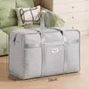 Bolsas de almacenamiento de tela no tejida engrosada para uso doméstico, adecuadas para guardar ropa y ropa de cama, a prueba de polvo y humedad, plegables, ideales para mudanzas, uso en dormitorios y para empacar y almacenar artículos.