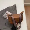 Bolsa de mão feminina retrô de comércio exterior 2026 novo estilo bolsa feminina moderna personalizada transversal de ombro bolsa de dumpling estilosa para o dia a dia