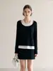 Suéter de punto minimalista en bloques de color blanco y negro para mujer, nueva colección 2026