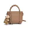 Versión Coreana Ins Bolso Exquisito Versátil Bolso Cubo para Mujer 2025 Nuevo Simple Personalidad Casual Bolso de Hombro Cruzado